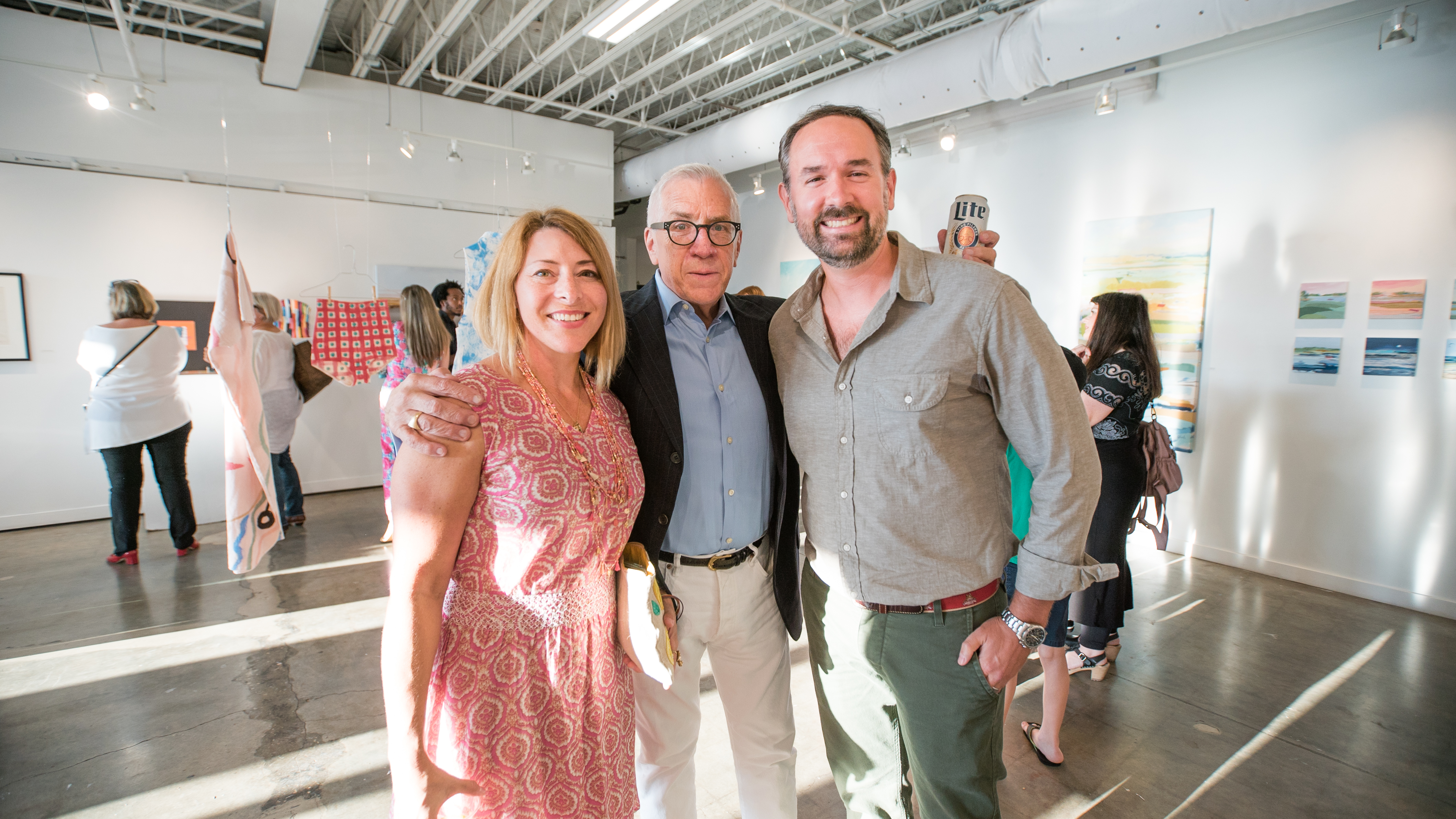 Curator Terry Fox of Charleston Arts Festival (center) with artists Karin Olah and Joel Parker
