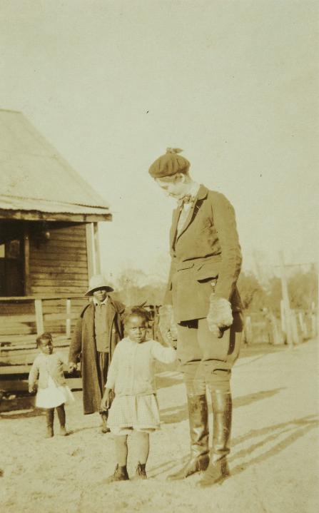 With students in Hobcaw’s Strawberry Village, circa 1930