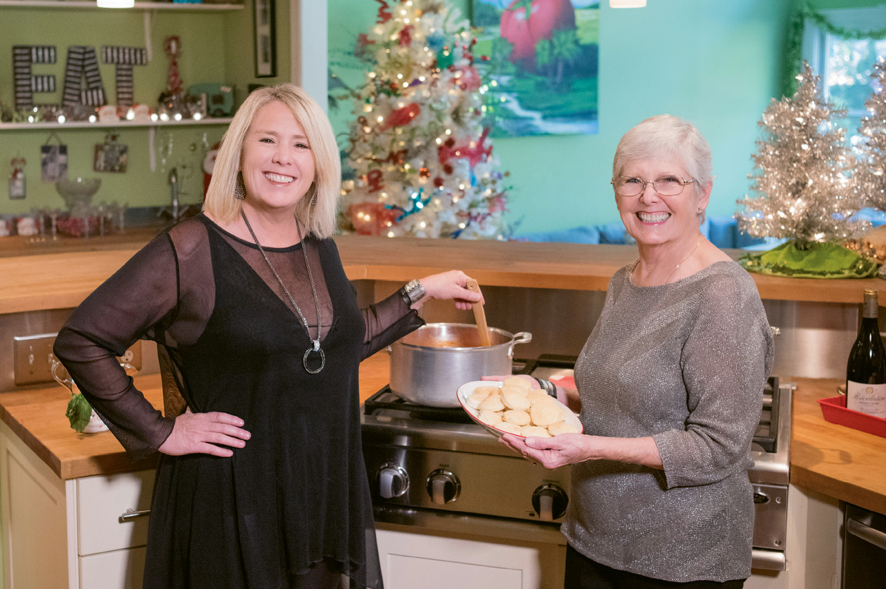 Mary Austin and her mother, Carole, prepare creamy tomato bisque and biscuits to serve with a lemony Greek chicken soup