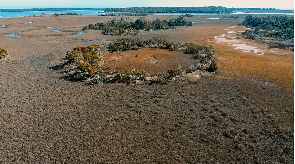 An aerial view of Fig Island near Botany Bay; archaeologists have studied and mapped its shell rings, which are carbon dated to some 4,000 years and contain shells and animal bones discarded by early inhabitants.<br /> 