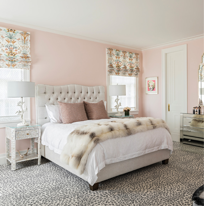 Pretty in Pink: The client’s daughter’s room in pale pinks and grays is livened by a mirrored dresser and leopard-print carpet.