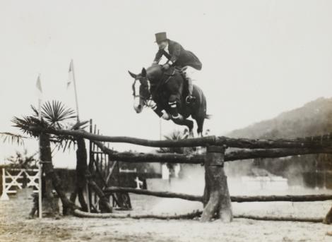 Jumping her Anglo-Arabian Souriant ⁄⁄/ during a 1931 competition in Italy; the German cavalry team would later offer to purchase the prized horse for Hitler. Belle flatly refused.
