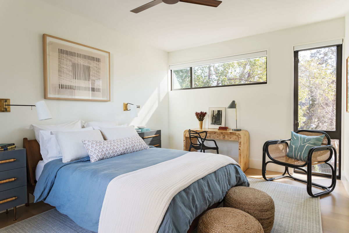 The three bedrooms in this wing have a stylish feel, highlighted by key pieces such as a burl wood desk and “Marte” lounge chair from Urban Outfitters.