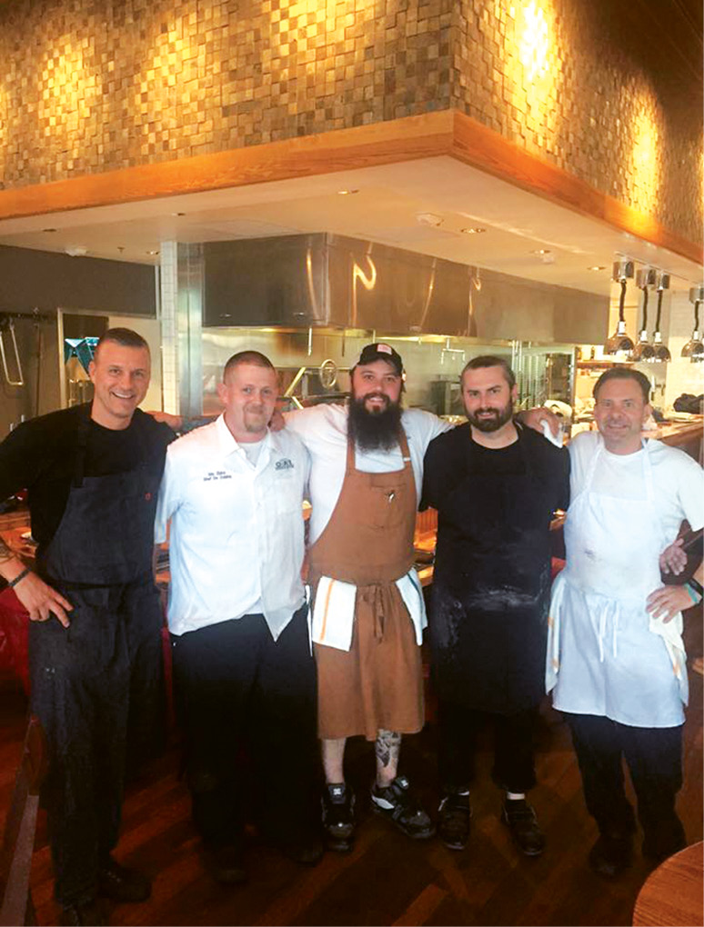 Ben (pictured far right) on opening night with chefs Scott Crawford, Eric Zizka, Bobby Hodge, and Elliot Cusher