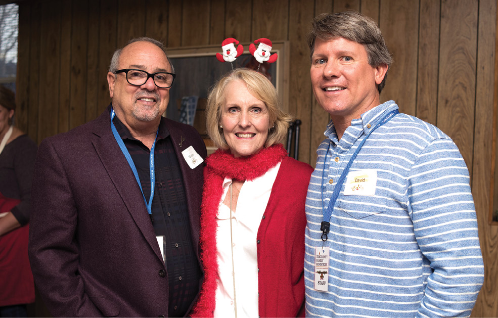 Feed the Need’s Mickey Bakst with Tricounty Family Ministries interim COO Sue Hanshaw and board member David Yarborough at the shelter’s holiday lunch