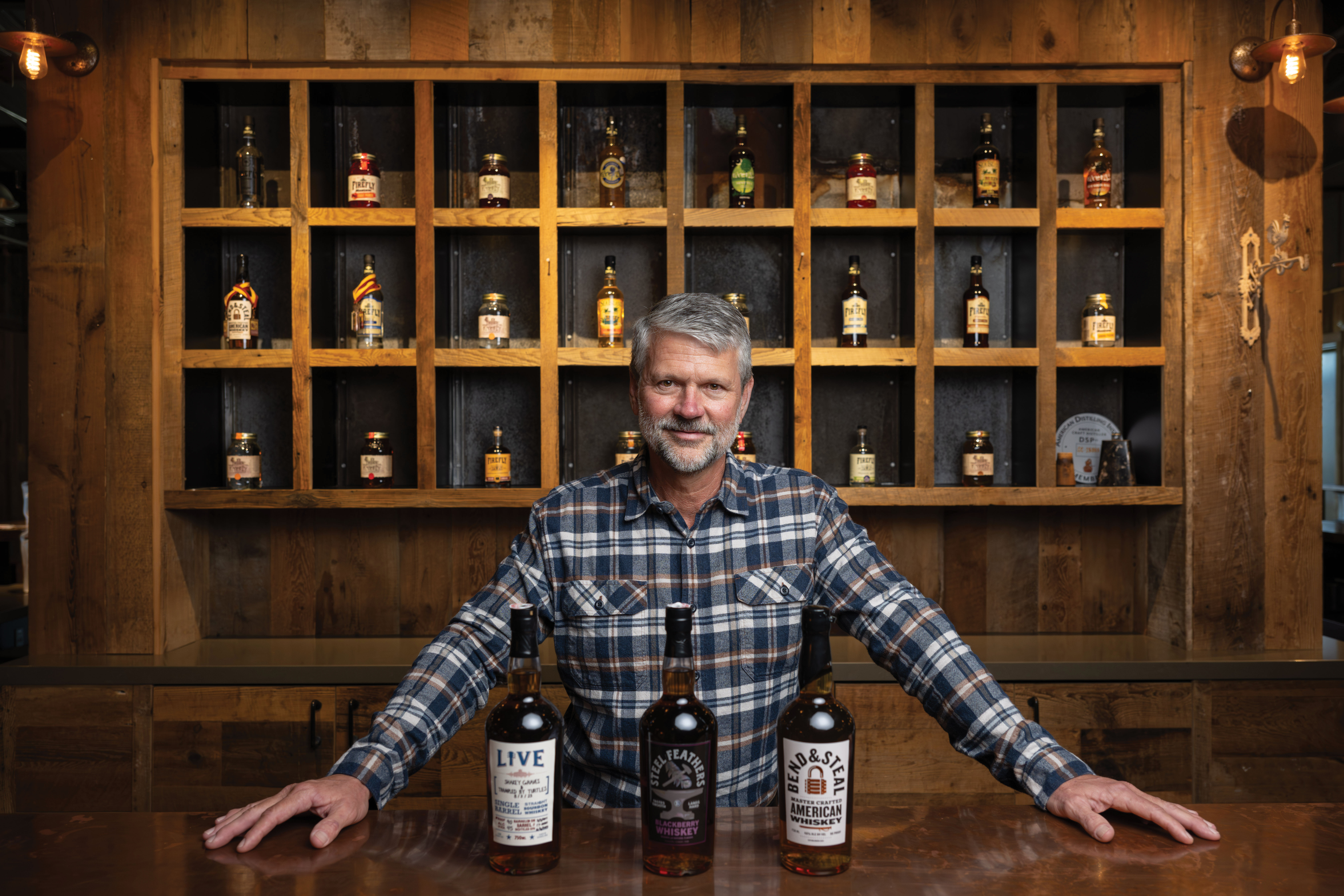 Blazing a Trail: Scott Newitt founded Firefly Distillery with his business partner Jim Irvin in 2005. By lobbying the legislature to lower prohibitive fees, they paved the way for the spirits industry in Charleston and the state.
