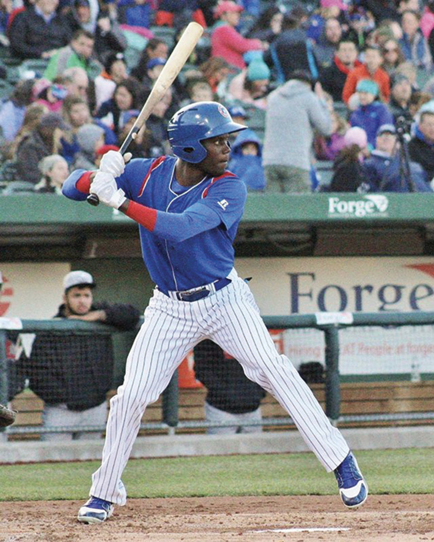 At bat for the Chicago Cubs, where he played for their minor league affiliate for two seasons.