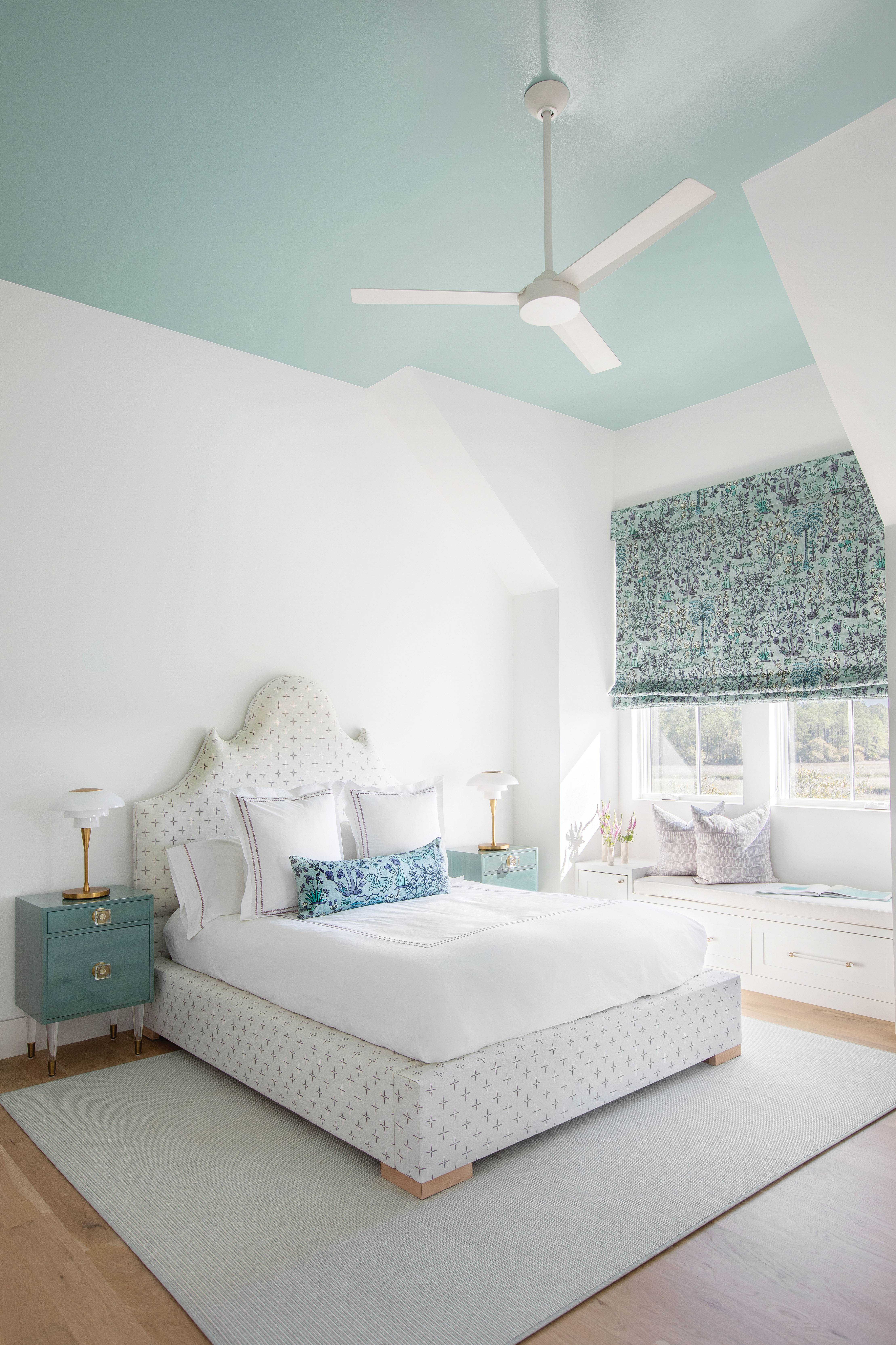 Color Her Happy: The daughter’s room (she still lives at home) features The Vale London “Mighty Jungle” cotton in “Lagune” on the window coverings. Its soft aqua carries through to the painted ceiling as well as the bathroom tile. “The fabric is so perfectly her!” says her mom.