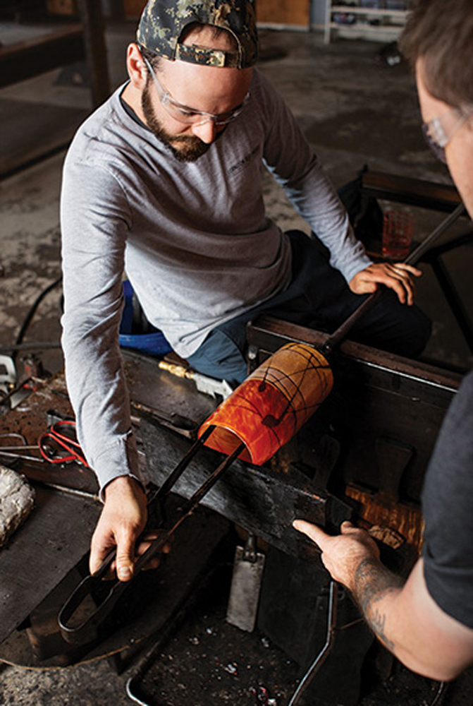 Glass Act: Lexington Glassworks is an open glass studio and gallery, featuring the works of founders Geoff Koslow (pictured) and Billy Guilford and their team. Through their new resident assistantship program, they’re attracting even more talent to Asheville.