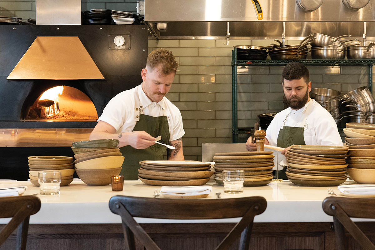 Chef-owner Mark Bolchoz (left) and chef de cuisine Alex Fagan in the open kitchen