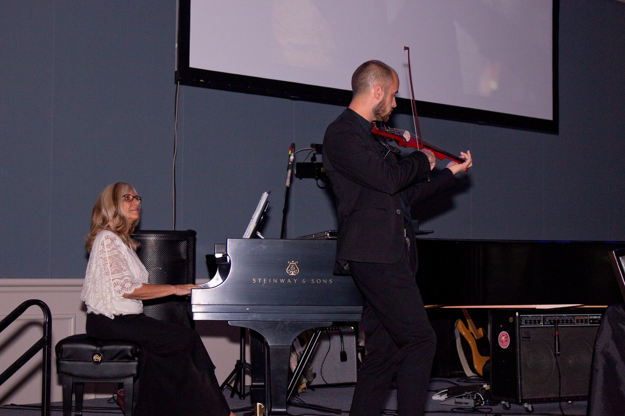 Annette Cantrell Martin from Steinway Piano Gallery of Charleston and electric violinist Peter Kiral kicked off the lineup of entertainment, performing ’70s classics.