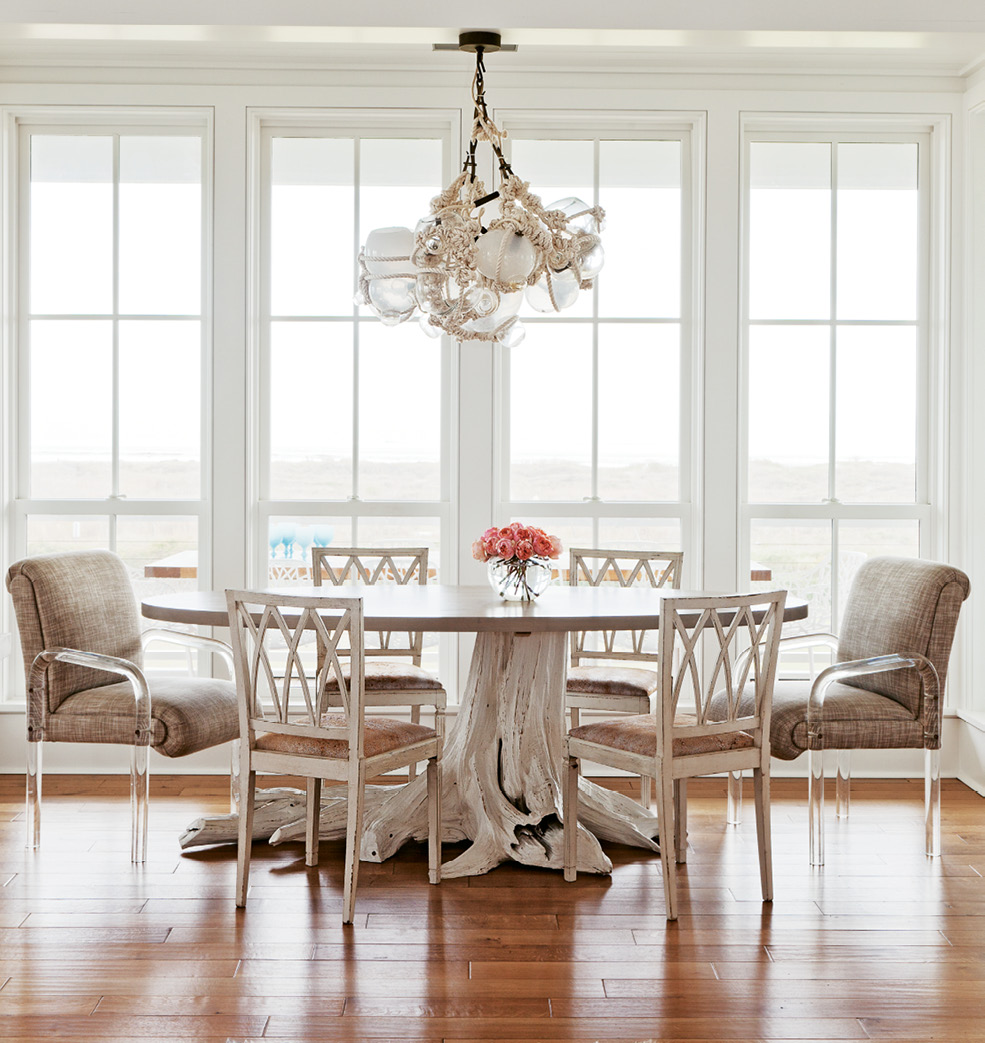 Furniture maker Brian Hall of Kistler Design Co. searched high and low for the perfect cypress stump to anchor the dining table.