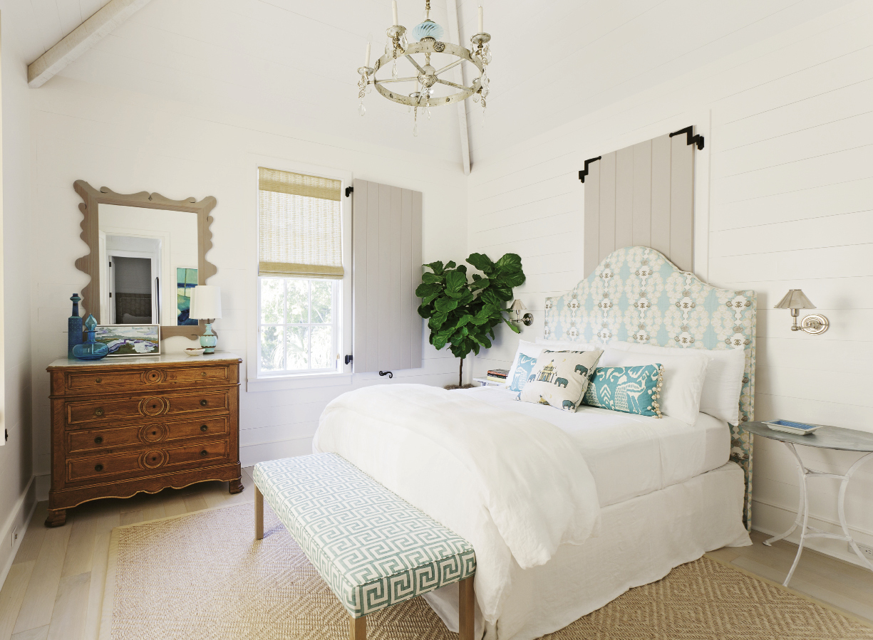 Beach Dreams: A guest bedroom, outfitted with dreamy creams and blues, proves that comfort and class can come in smaller sizes.