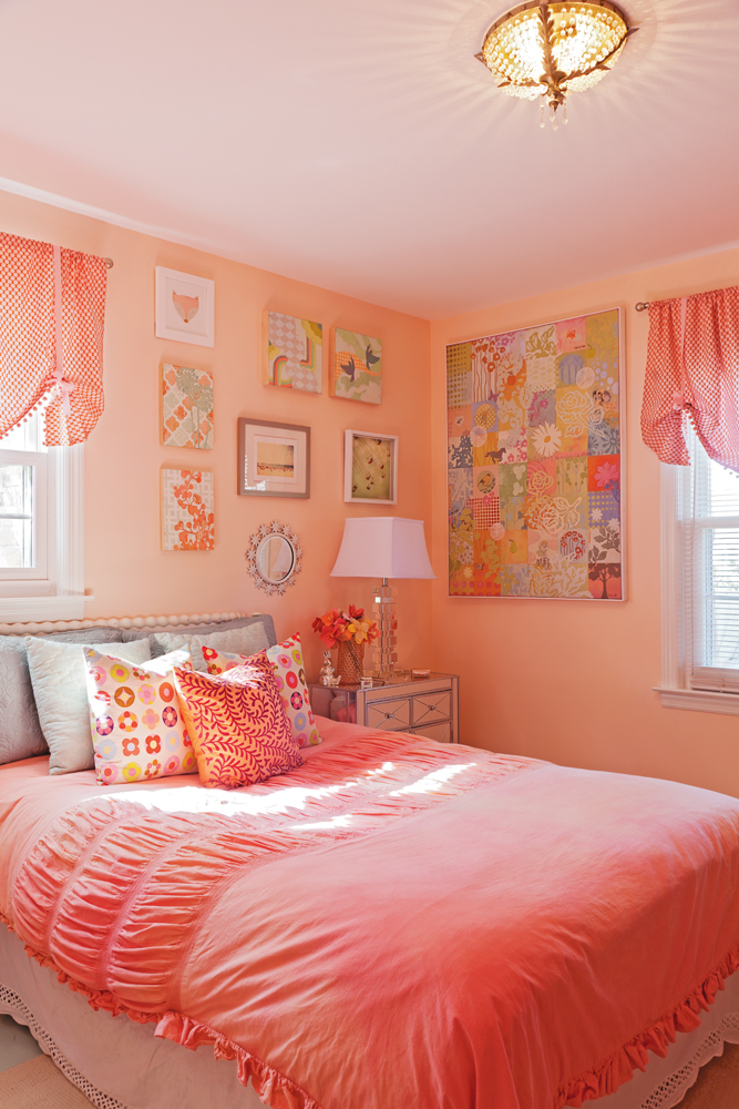 Pink rules in Ruby’s room, complemented by Mom’s artwork, custom window treatments, and more grown-up furnishings like the mirrored side tables.