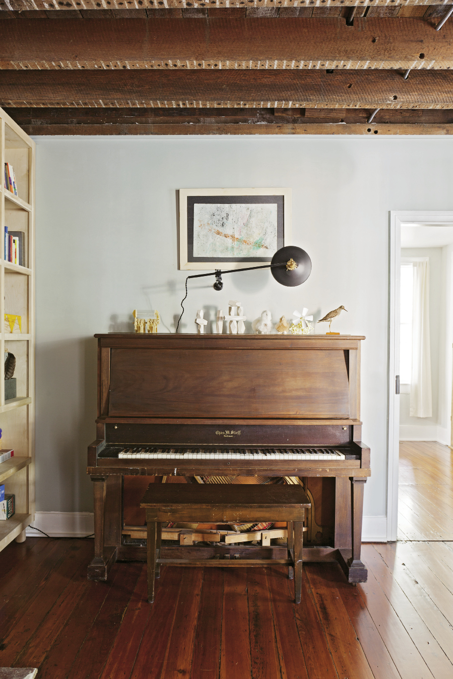 A piano found for $10 on Craigslist reflect the couple’s resourcefulness.