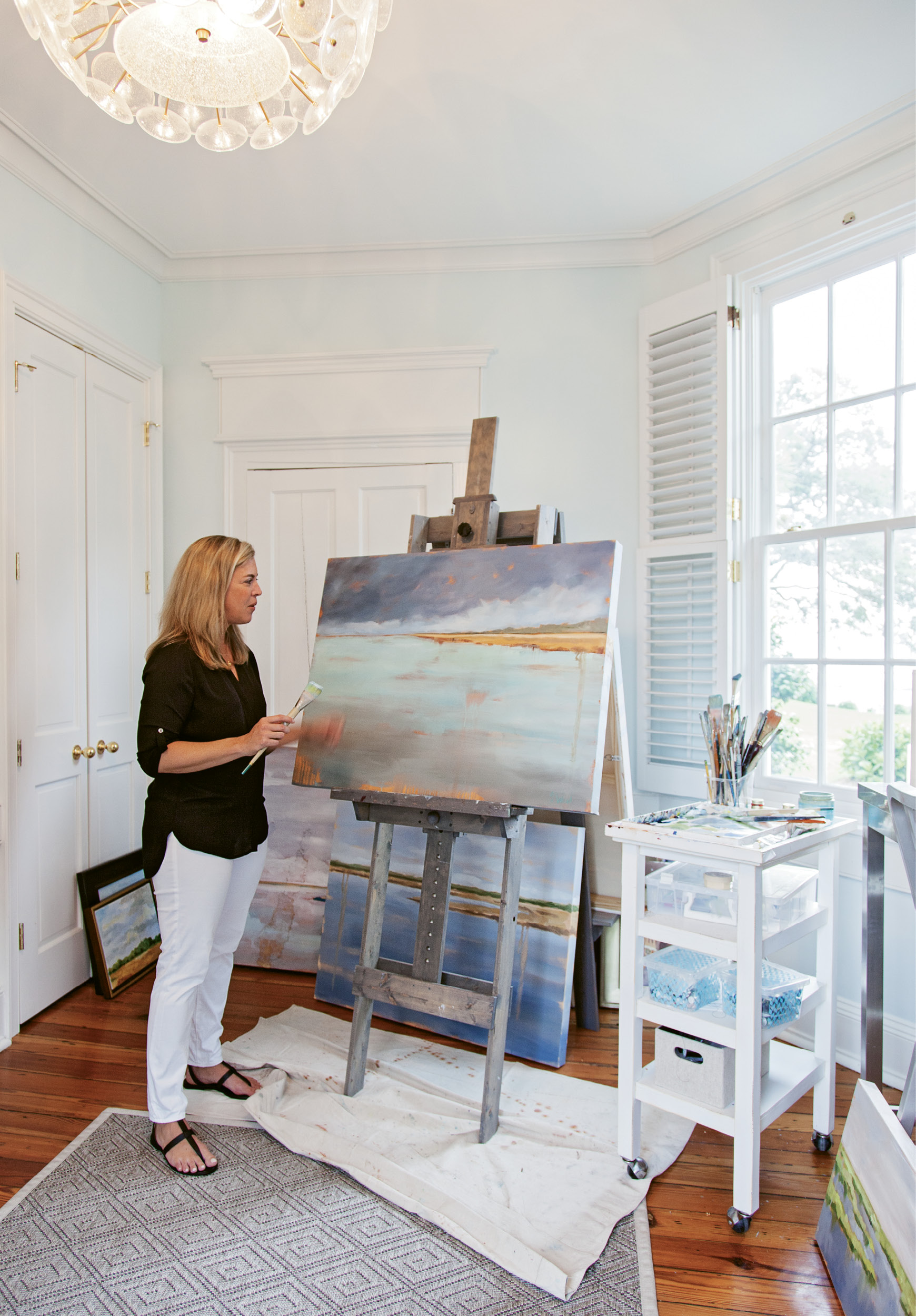 The breathtaking harbor view from Shannon’s airy studio window provides the Lowcountry native with ever-evolving inspiration for her abstract landscape paintings, which are available through the Charleston Artist Collective.