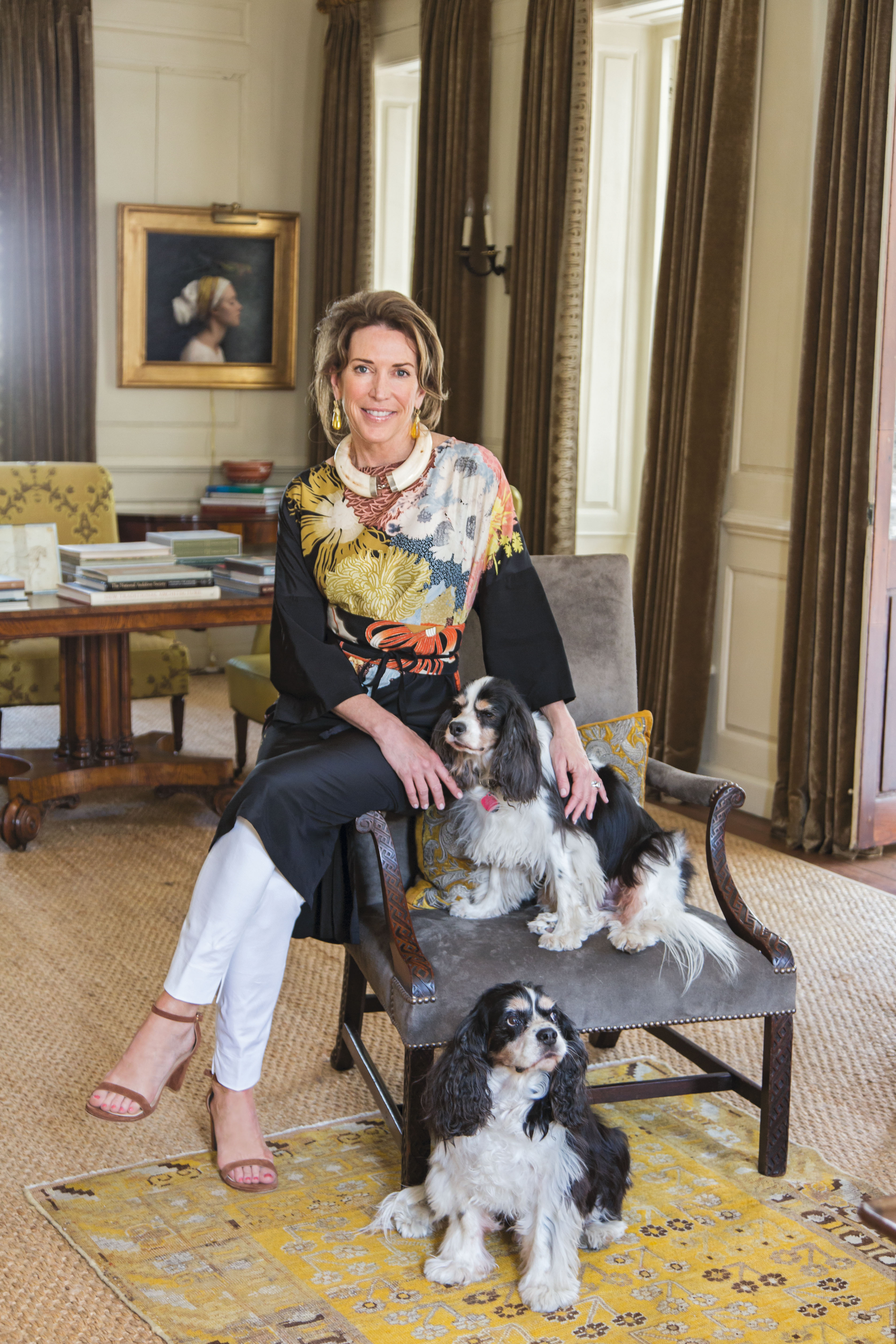 Ann Long Merck with pups Winston and Buckley (left) in the second-floor drawing room of the 18th-century Georgian she shares with her husband, Tony.