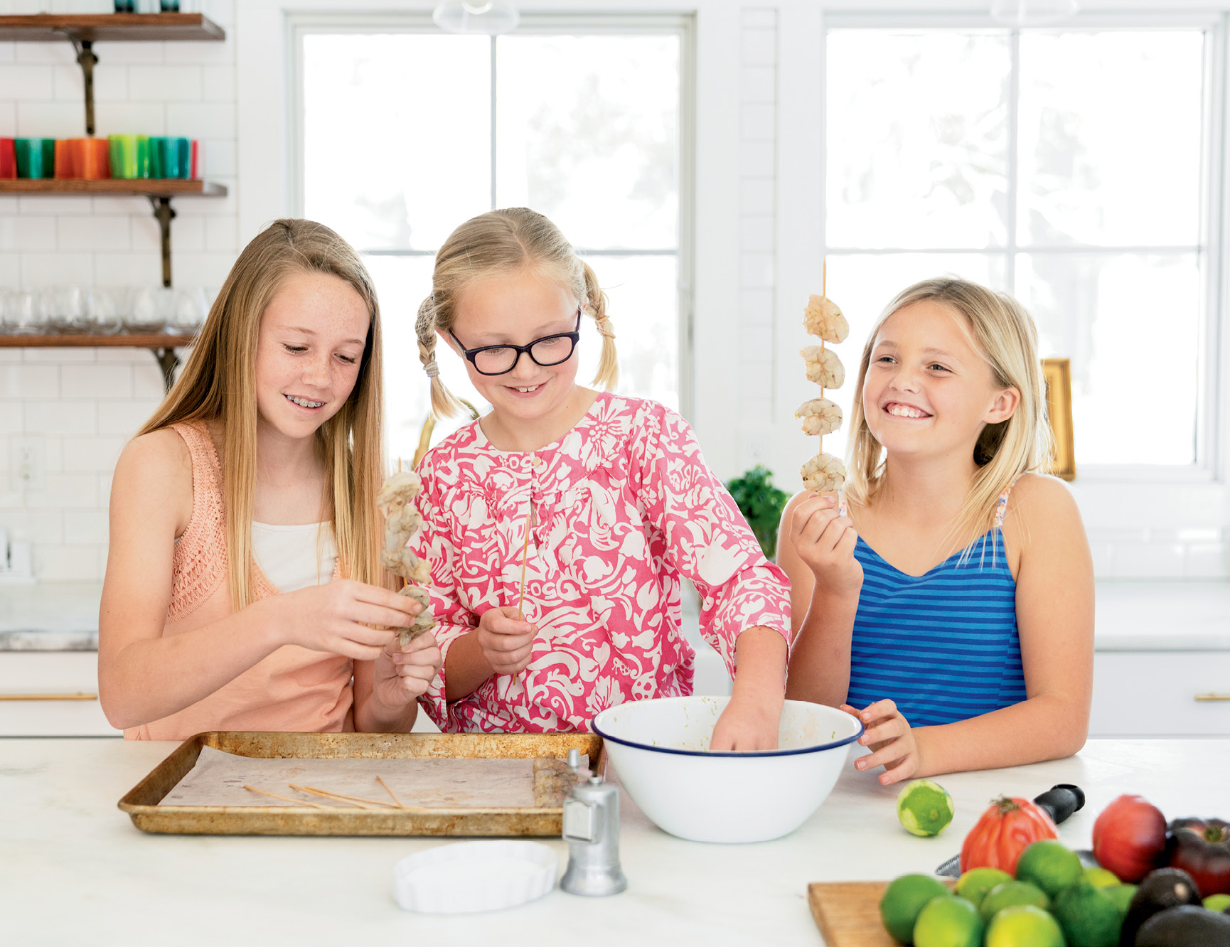 “We live two blocks from the best seafood around,” says Carrie Morey, who sends her daughters, Caroline, Cate, and Sarah to Shem Creek to buy shrimp.