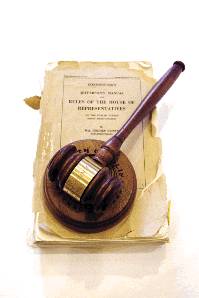 in his new office, this gavel rests atop his dog-eared copy of Jefferson’s Manual, which he has used for more than 30 years. Photograph by Caroline Tan