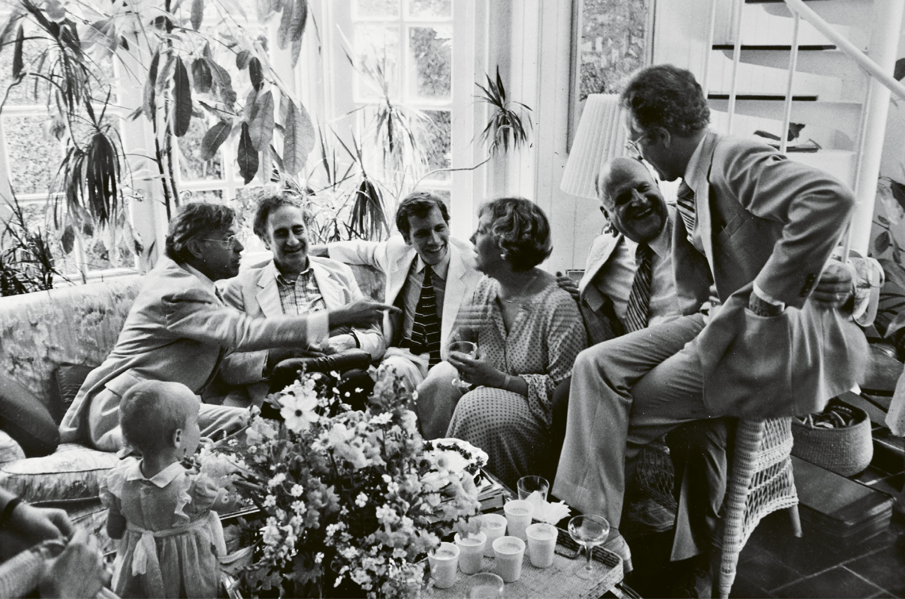 GARDEN PARTY: Ever the hostess, Patti entertains (from left) Charles Wadsworth, Gian Carlo Menotti, Jim Kearney, Ted Stern, and Scott Nickrenz in the McGee family sunroom overlooking the garden, after a Spoleto Festival USA chamber music concert in 1979.