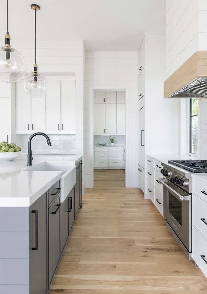 “Shiplapping the whole house was in line with coastal living, but we removed all decorative trim elements to create a minimal, unfussy vibe,” says Lenox.
