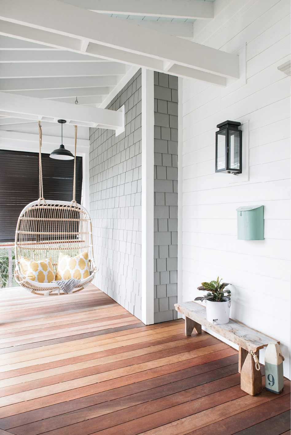 “I love that the design is modern yet has a vintage appeal about it,” says Melissa about the rattan porch