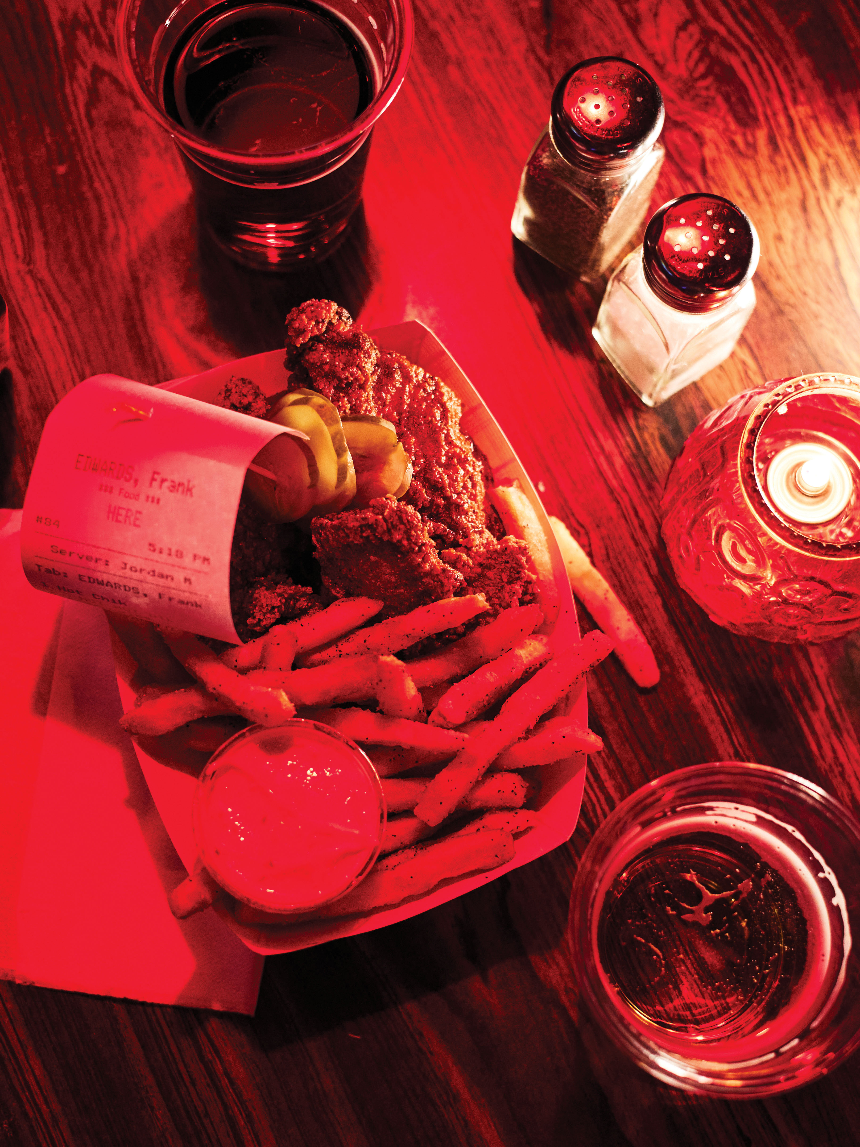 The hot chicken, fries, and beer at Dino’s.