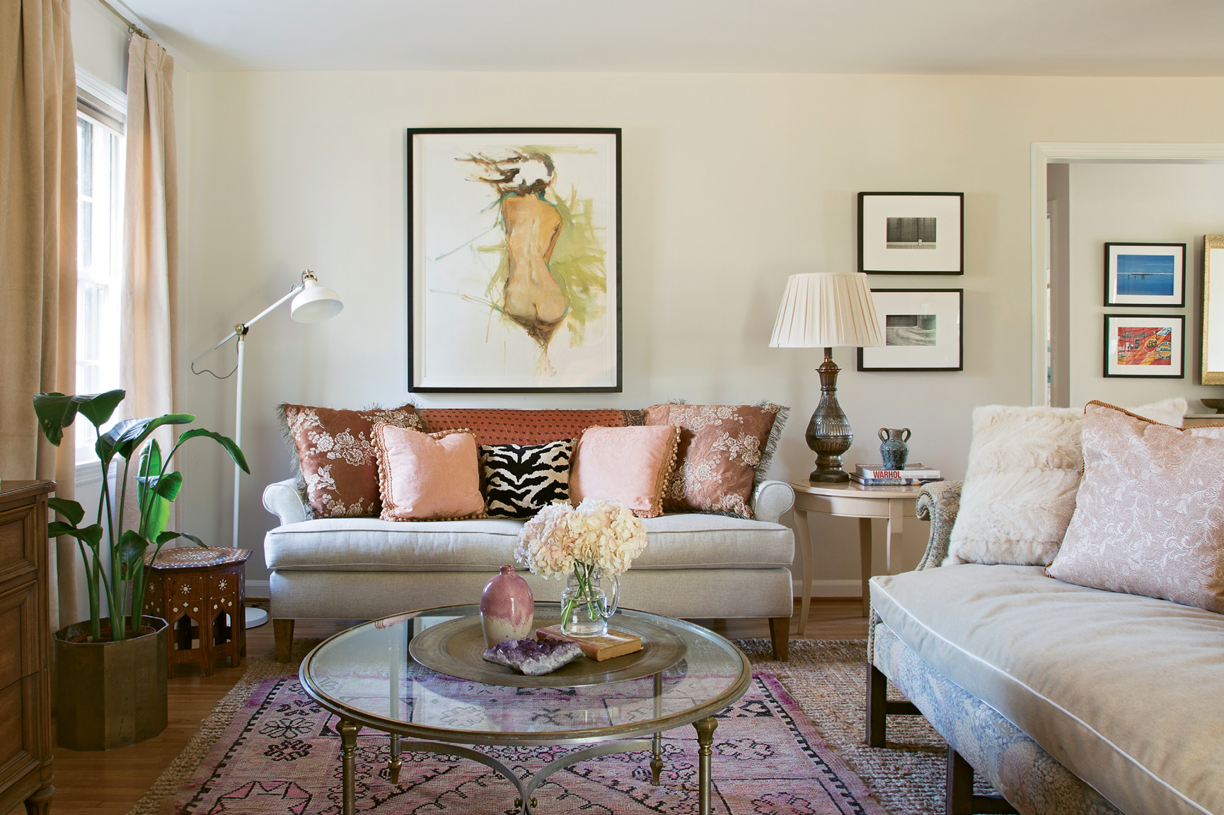 PERSONAL SPACE: When Charleston County Treasurer Mary Tinkler enlisted designer Erin Glennon to help overhaul her mid-century ranch, she wound up with a feminine retreat filled with meaningful pieces, including artwork collected over time and vintage furnishings that reflect her love of history.