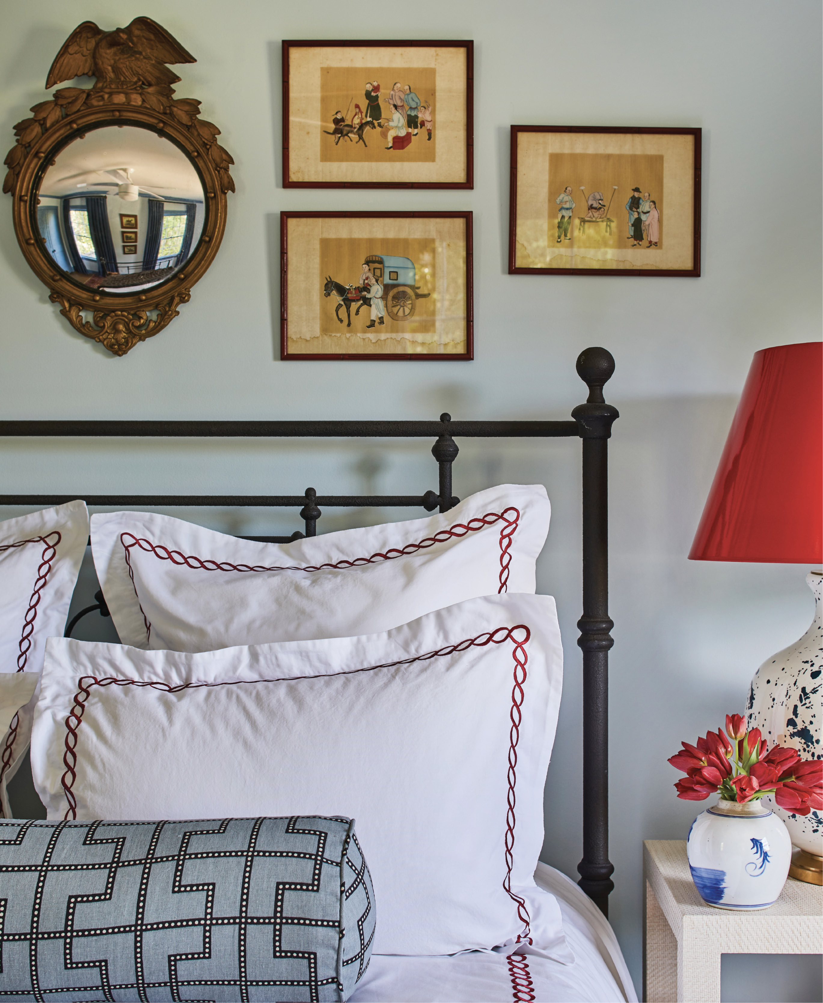 Each of the home’s three bedrooms has a distinct vibe. In the luxe primary bedroom, Cooper mixed chintz and men’s suiting fabric for a traditional bed canopy, which helped address the room’s odd angles.
