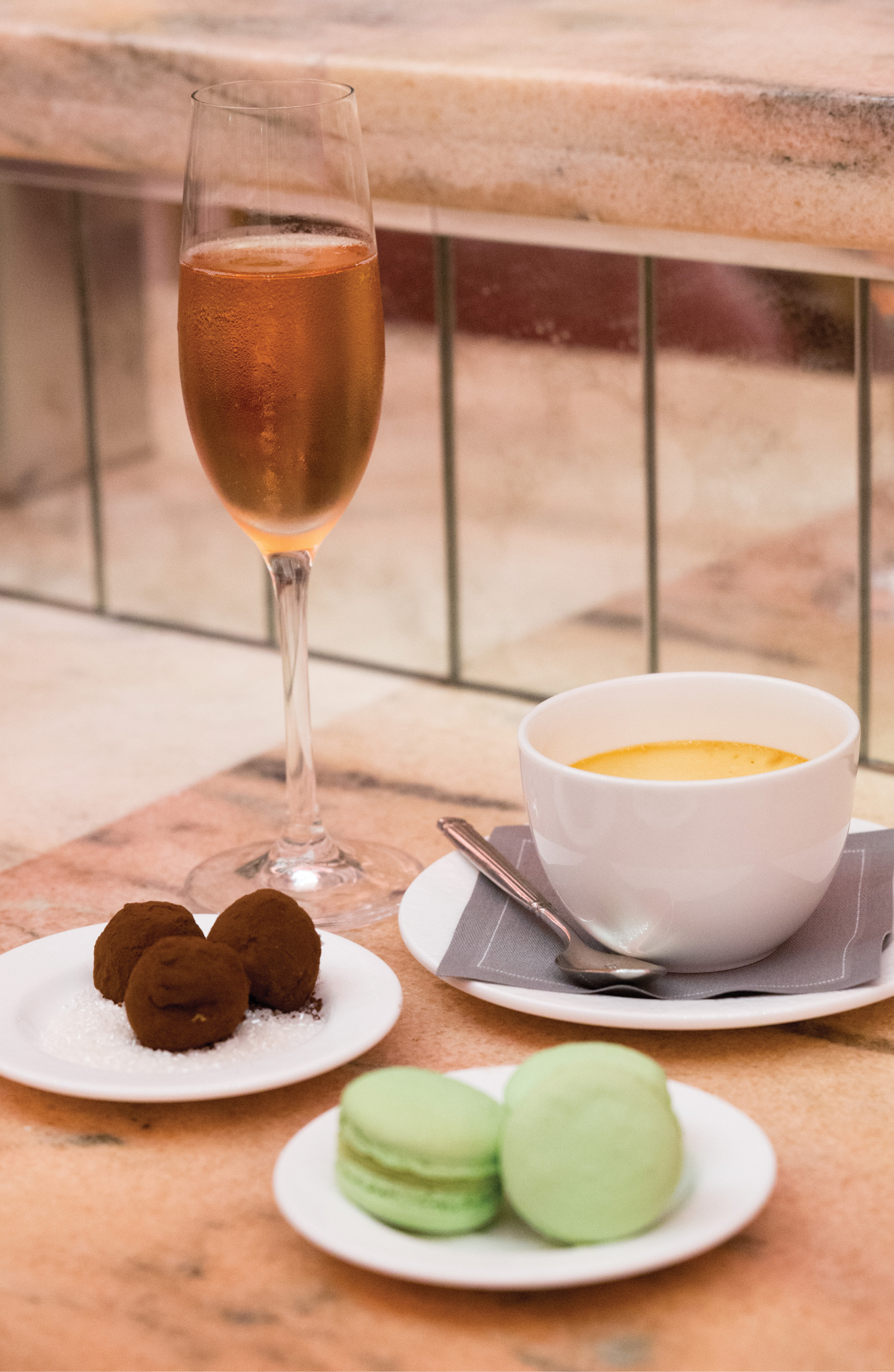 Toast of the Town: Chef Rémy Fünfrock’s (inset above) on-menu confections can be enjoyed throughout Hotel Bennett. At champagne bar Camellias, a glass of sparkling rosé makes for a perfect pairing with his sweets.