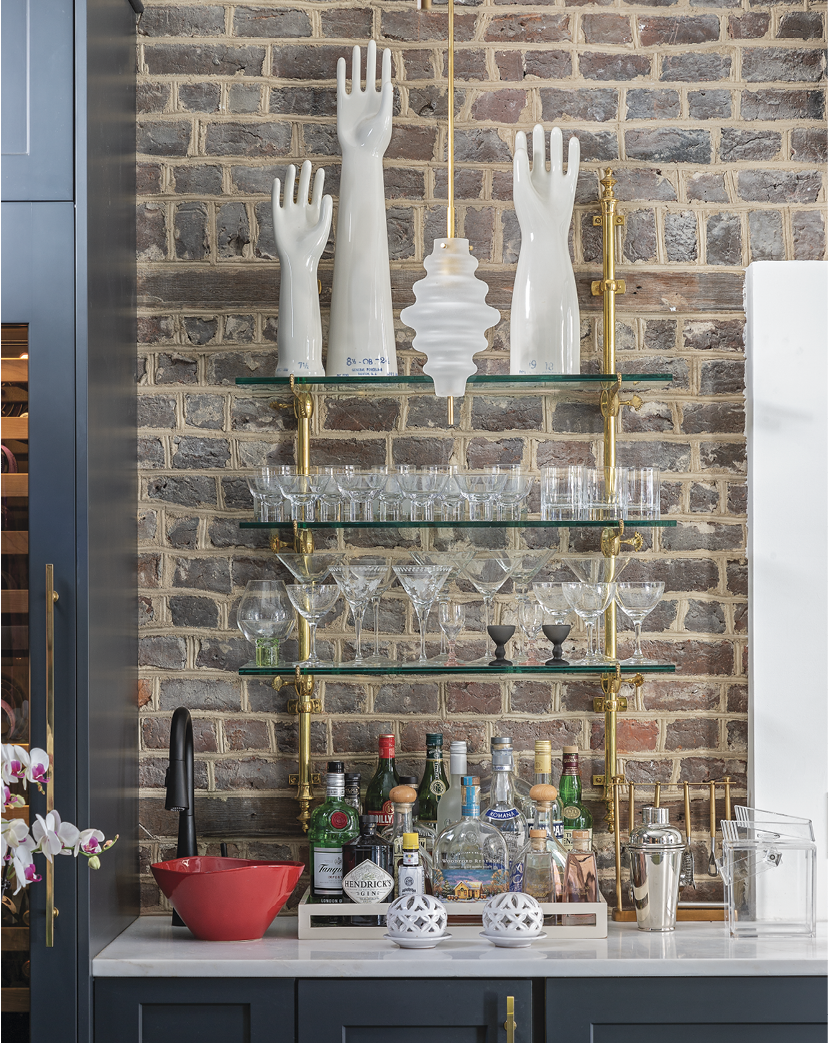 There, a bar adorned with vintage porcelain glove molds provides a spot to procure libations.