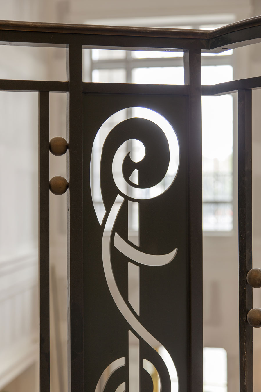 Base and treble clef notes inspired the railing designs, with much of the millwork sourced locally.