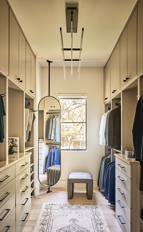 A sleek closet complete the suite.