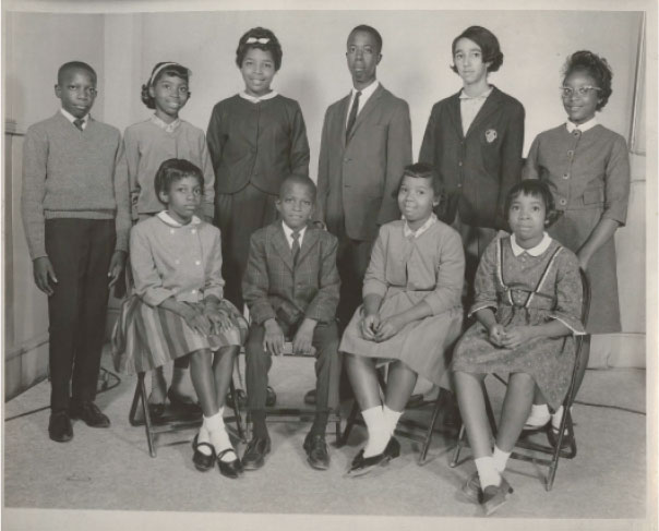 The First Children: Though doors opened for Millicent and her 10 fellow plaintiffs—(pictured from left to right, standing) Clarence Alexander, Barbara Ford, Jacqueline Ford, Ralph Stoney Dawson, Millicent Brown, Clarice Hines, (and seated, left to right) Cassandra Alexander, Gerald Alexander, Gail Ford, Oveta Glover, and (not pictured) Valerie Wright—to attend peninsula public schools in September 1963, many faced ostracism, and worse. “Some of the others were much younger than I was,” says Millicent, who still feels guilty for not being able to support her fellow Rivers High attendee, eighth grader Jackie Ford, whom she wouldn’t cross paths with during the school day. “They were more vulnerable than I was.”