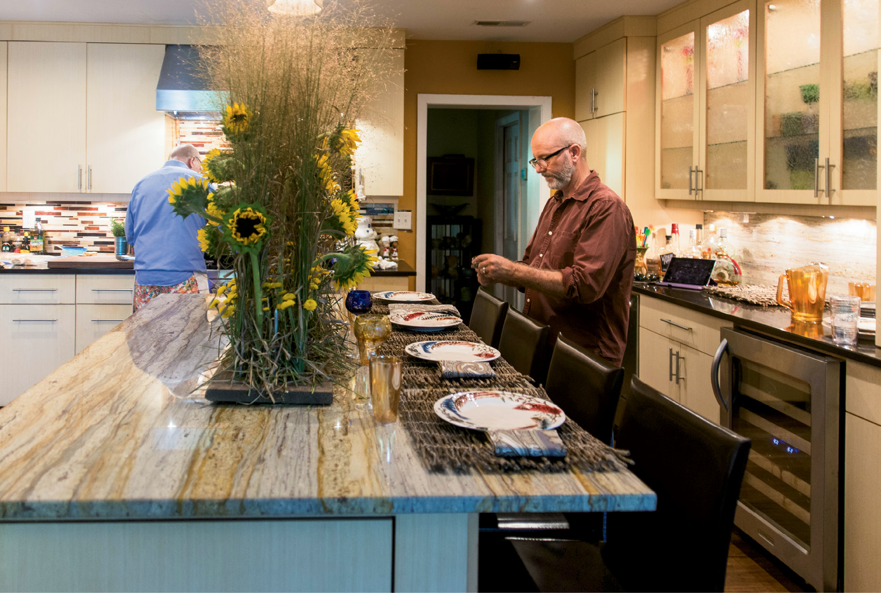 David Vagasky (left) preps the meal while Jim Martin sets the dining space.
