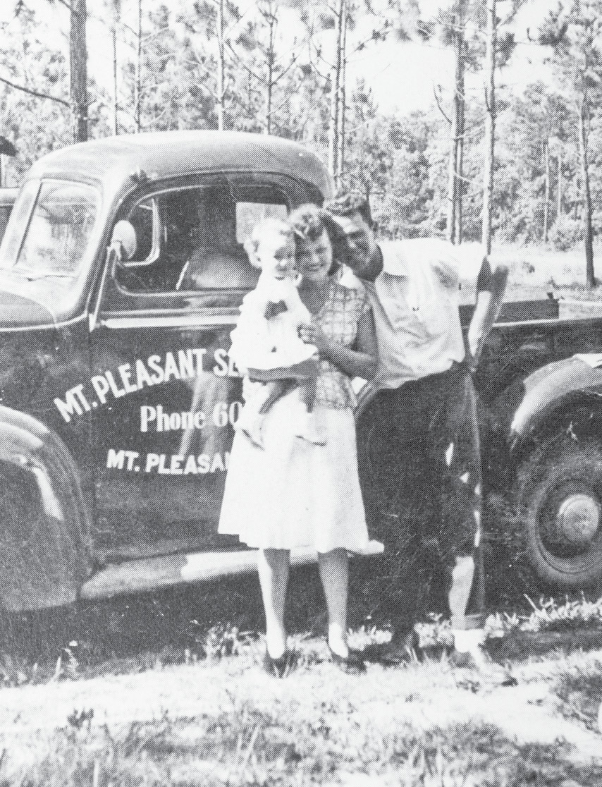 Captain Walter Toler of Mount Pleasant Seafood poses with his wife, Lillian, and daughter, Peggy.