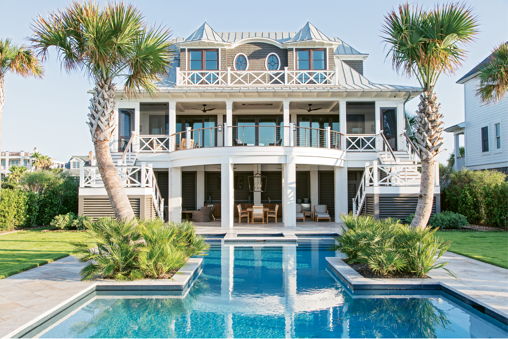 Beachside Oasis: Homeowners Mike and Mary Lamach worked with architect Steve Herlong and interior designer David Smith to conjure their vacation home; the symmetrical design is influenced by both Caribbean and Lowcountry architecture.