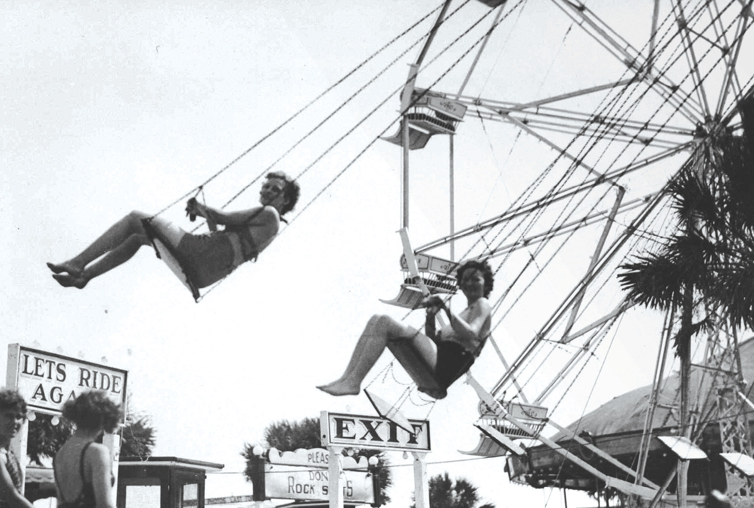 The swing ride at the amusement park in the 1960s