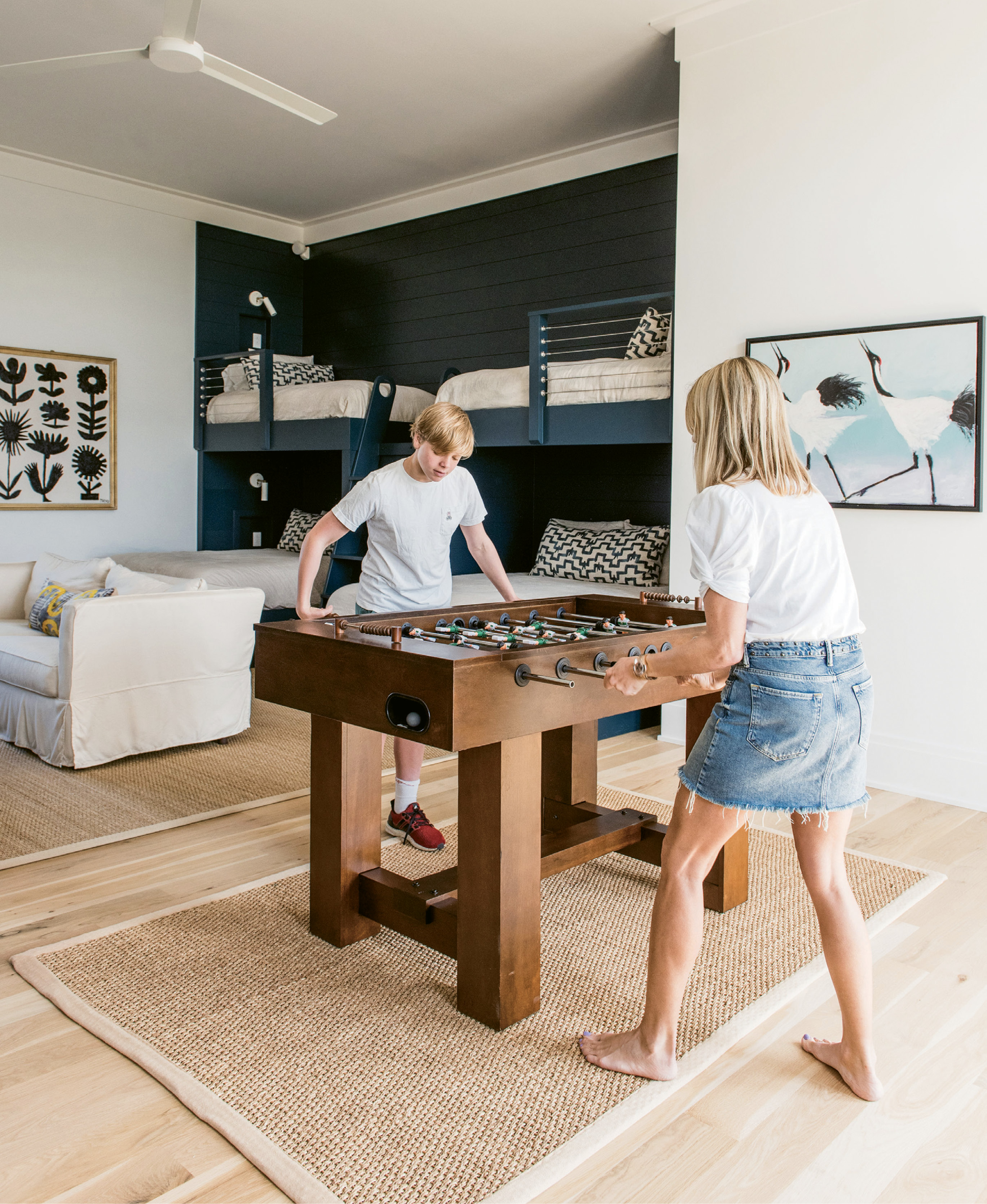 Boasting a foosball table and big-screen TV, the bunk room—which is situated between the children’s rooms on the top floor—is a dream for sleepovers. Even so, its full bath, balcony access, and quartet of comfy beds make it equally inviting to visiting adults.