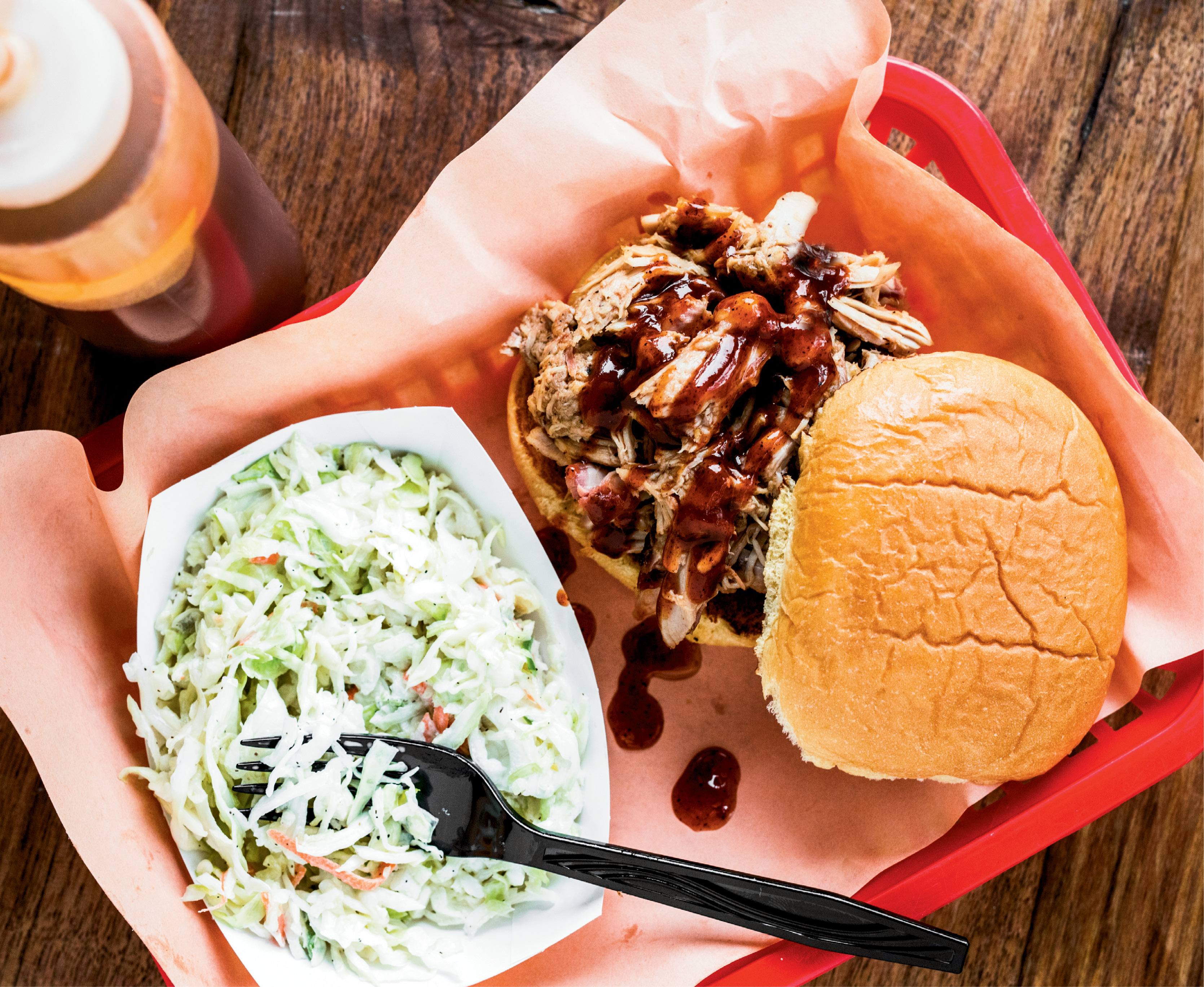 Rodney Scott has a line out the door at his new pithouse, serving up saucy pulled pork sandwiches, creamy coleslaw, and more