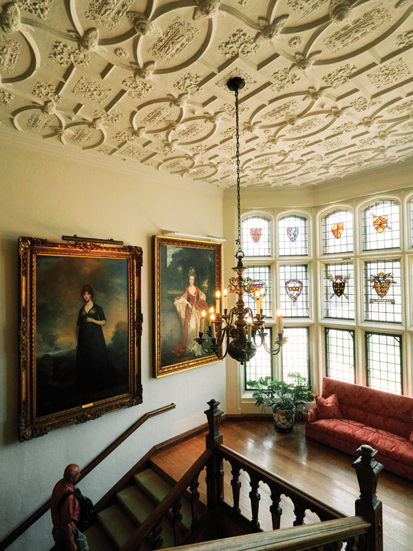 Portraits in the stairwell at Rough Point, another Newport mansion that was the longtime seasonal home of tobacco heiress and art collector Doris Duke.