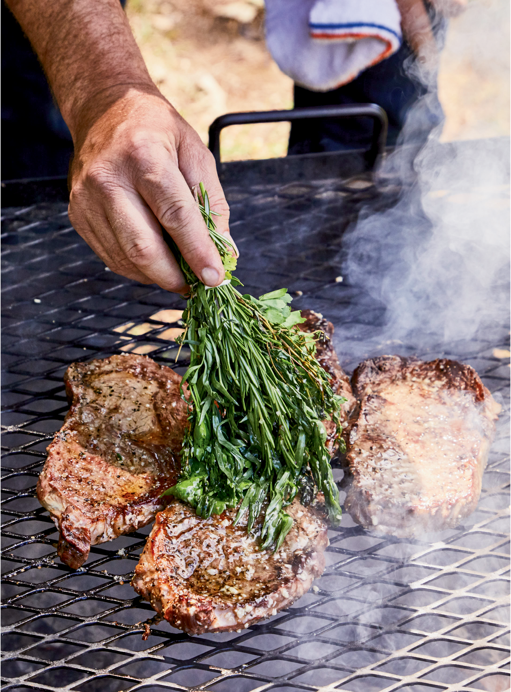 Wood-Grilled Rib Eyes with Herb Brush