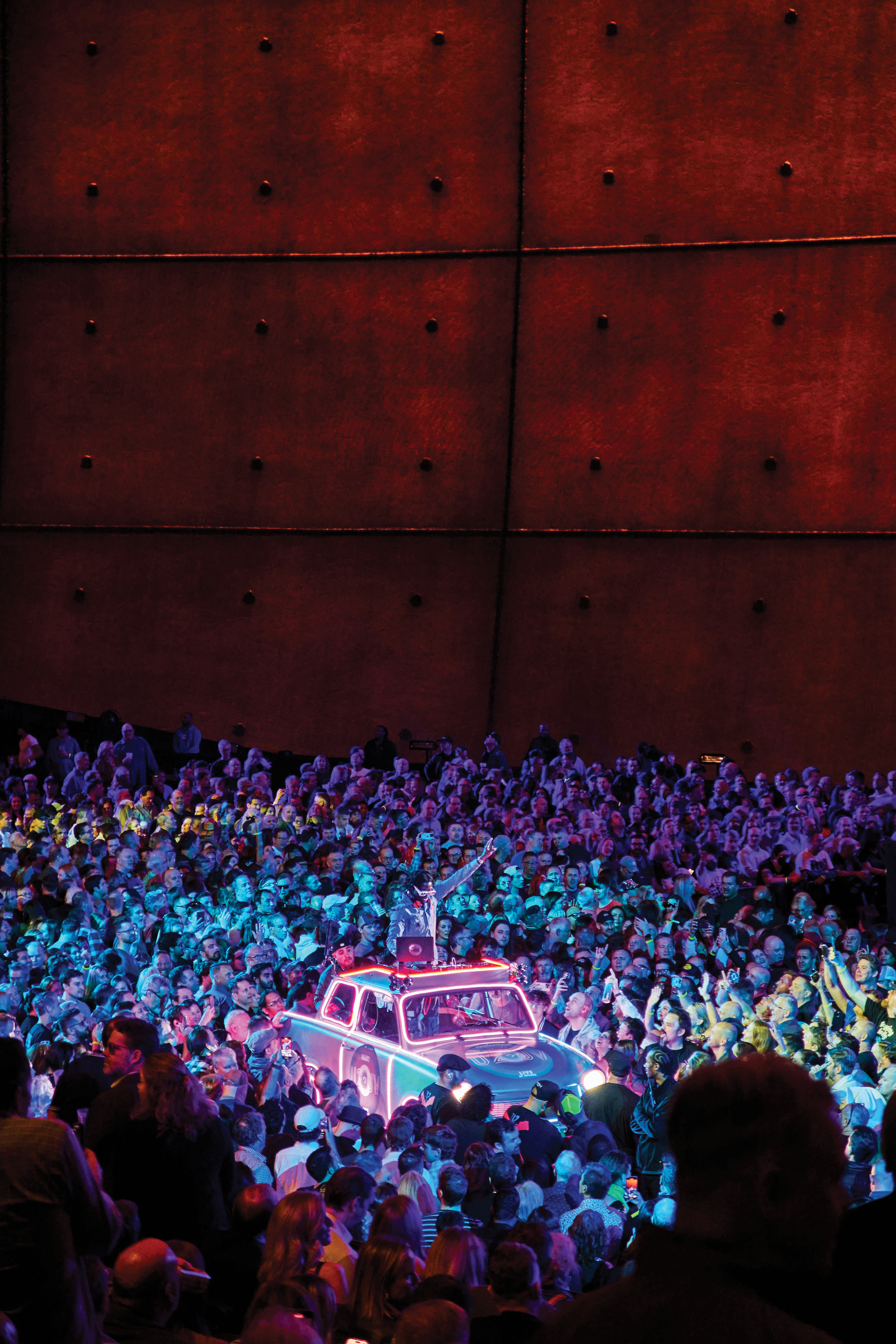 The crowd dances in the Sphere to music spun by Pauli “the PSM” Lovejoy during a U2 pre-show.