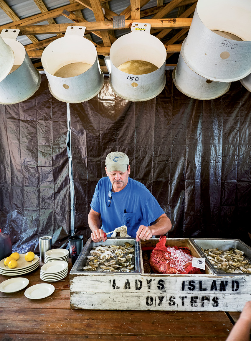 Frank Roberts, founder of Lady’s Island Oysters, with some of his catch on ice