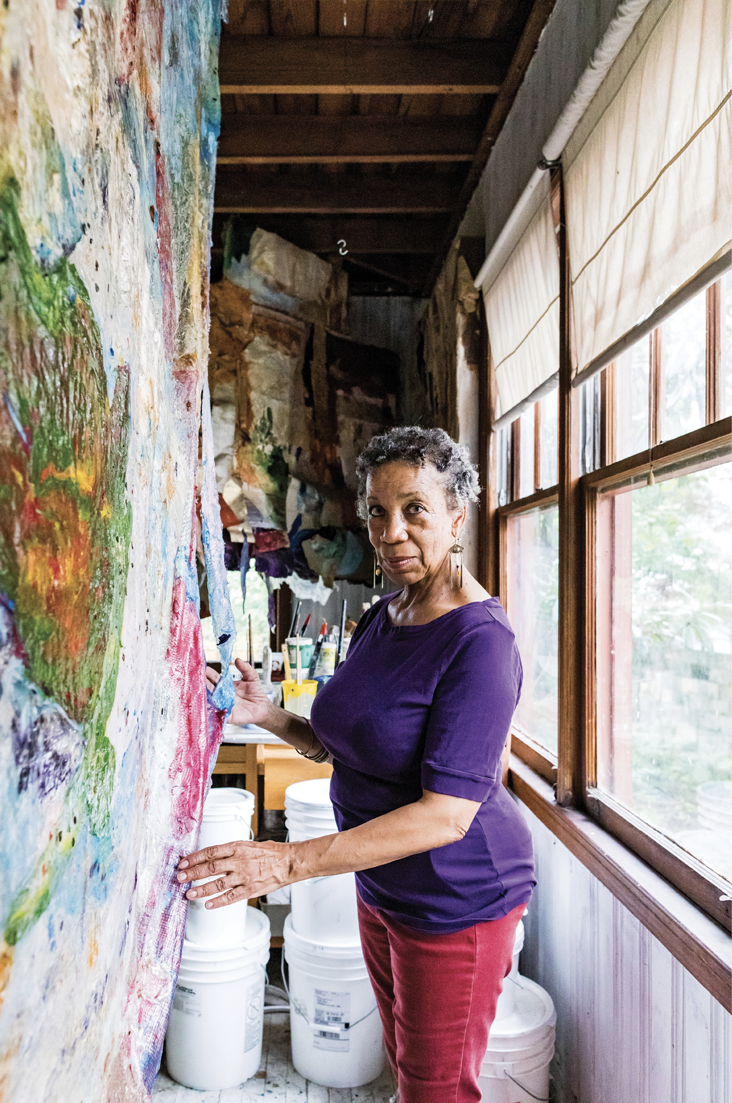 Artist Suzanne Jackson in her home studio in the Starland District; a retrospective of her work titled “Five Decades” was featured last year at the Telfair Museum’s Jepson Center. Her recent paintings are sculptural layers of acrylic—no canvas, no frame.