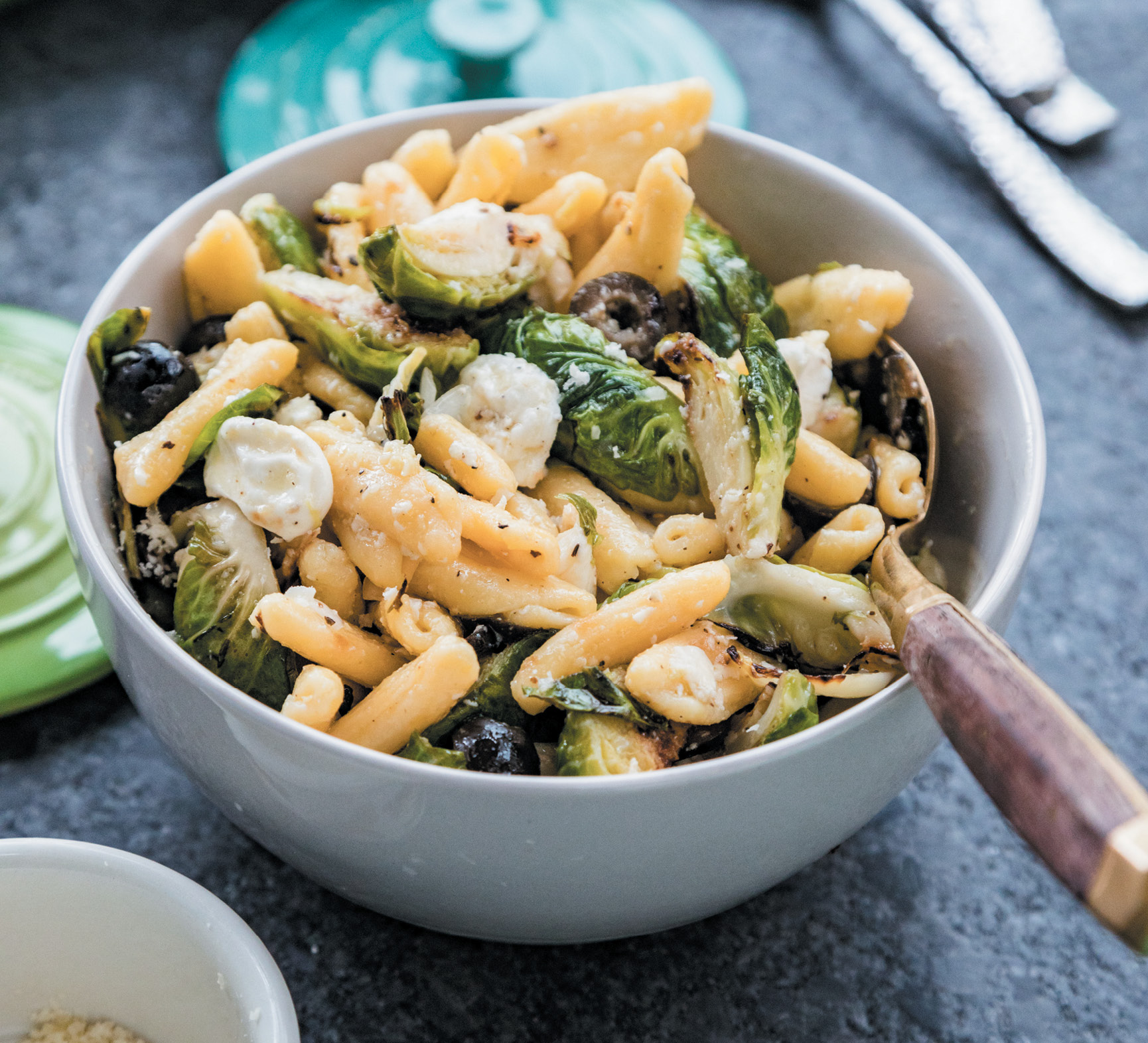 Pasta salad tossed with lemon-pepper dressing can be served warm, cold, or at room temperature. Postell likes to refrigerate the dish overnight—letting the flavors sink in—and serve it the next day.