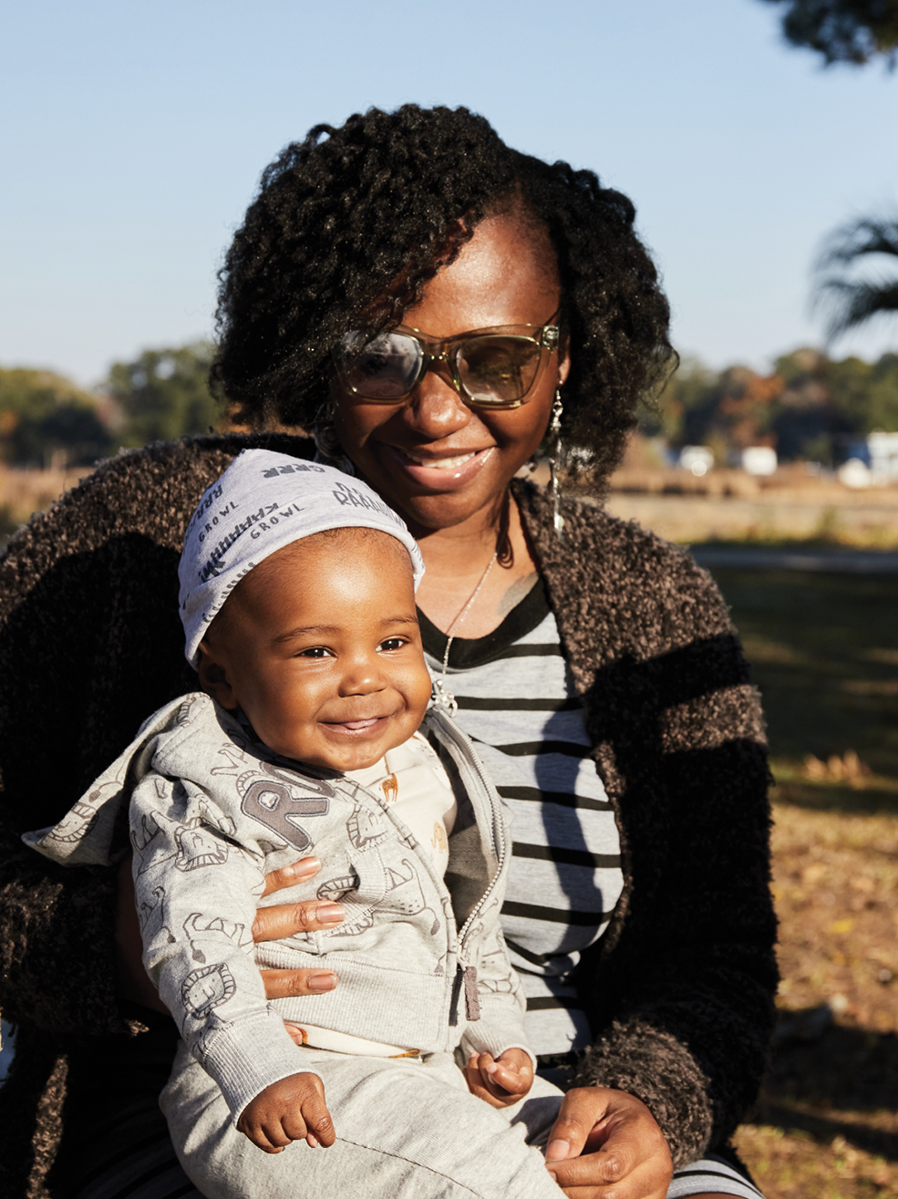 Dennis’s wife, Shenay, and nine-month-old son, Mekhi, at Joseph Fields Farm.