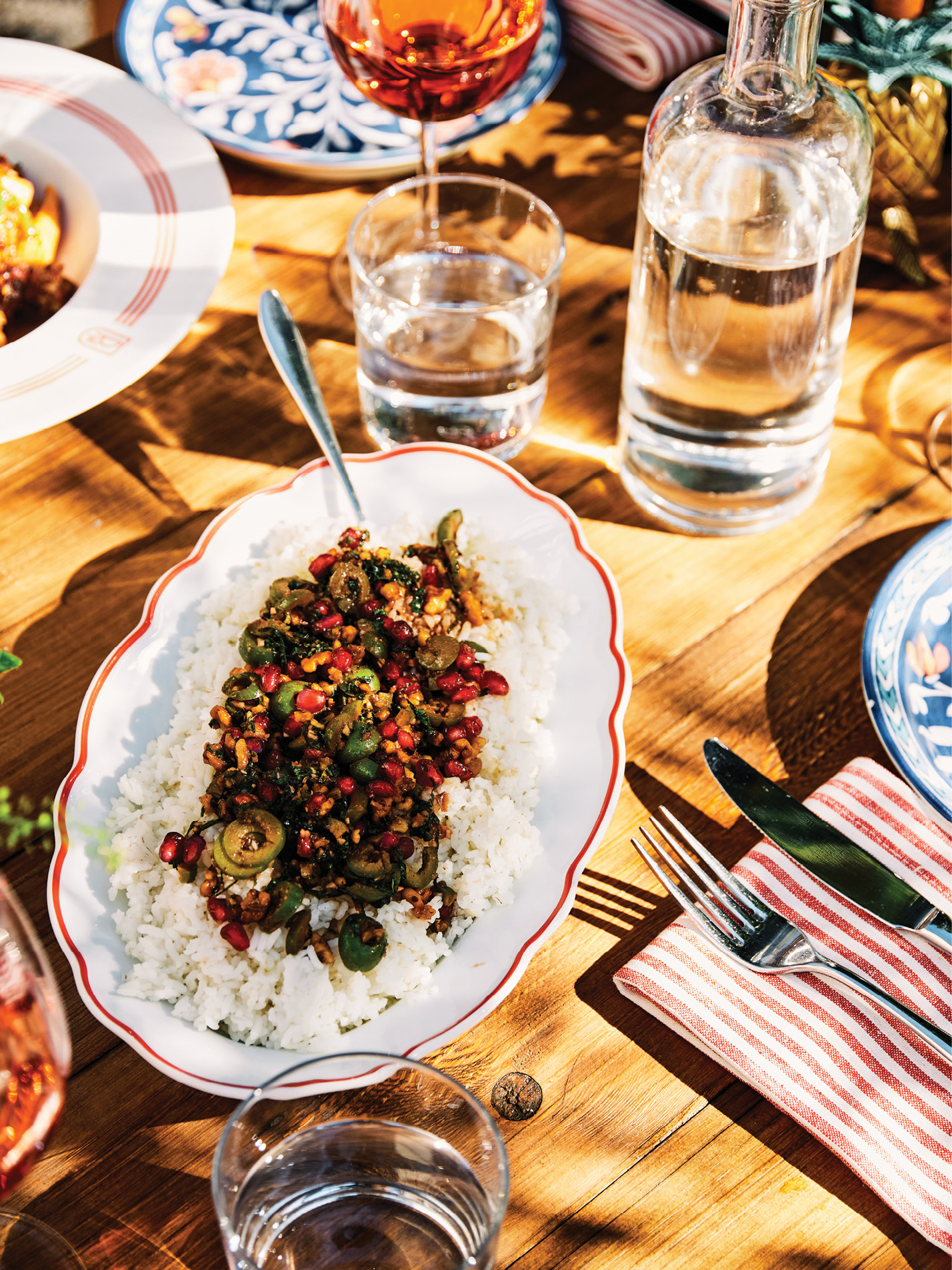 The day’s menu brings together favorites from both Basic Kitchen and the Post House, including this fragrant Charleston Gold rice pilaf with pomegranate, mint, and olives.