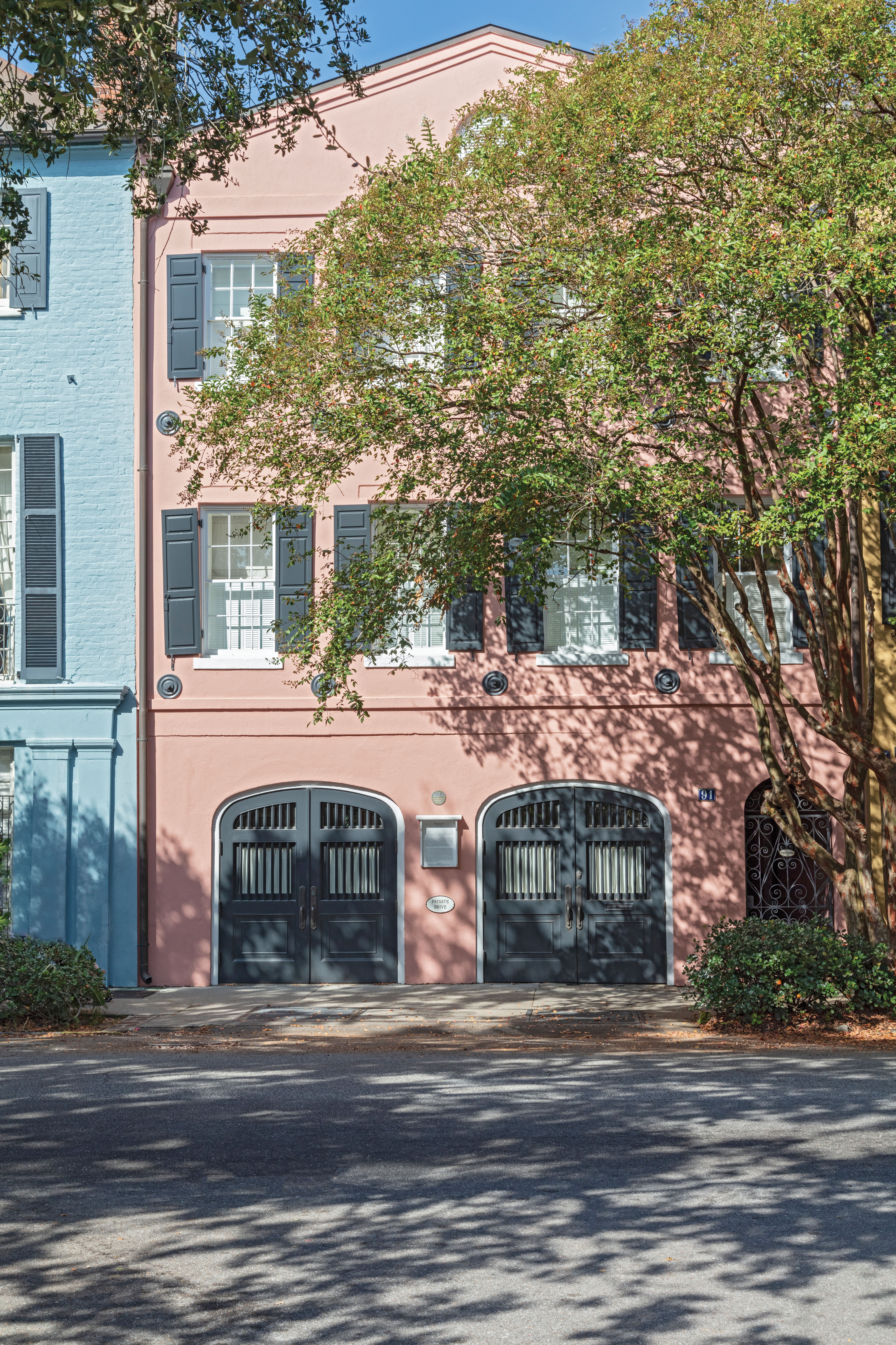 Pretty in Pink: The home required minimal renovation for the couple and their 13-year-old son to move in late last year. A fresh coat of “Damask Rose” from the Sherwin-Williams Historic Charleston Collection for the exterior and some colorful updates on the interior helped breathe new life into the centuries-old residence.