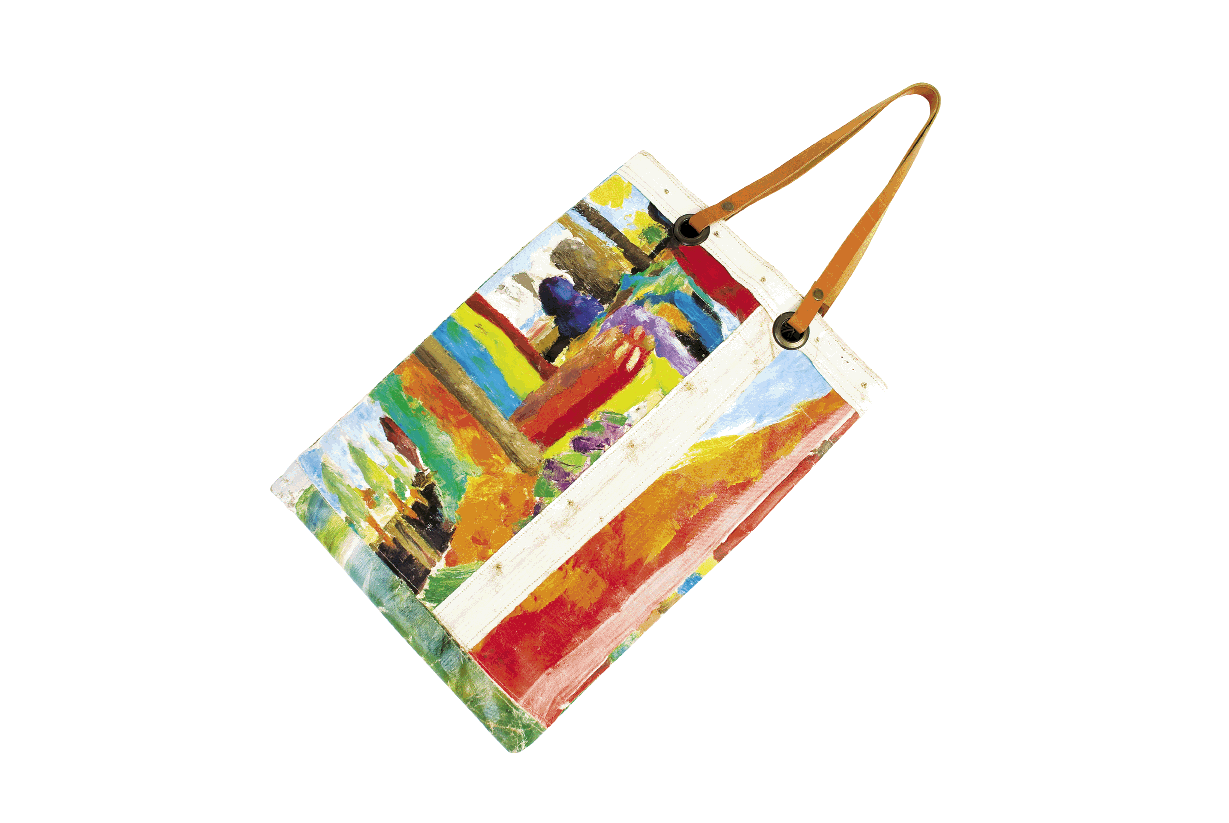 Leslie Orchman hand-painted canvas tote with leather handles and 21-inch strap, $395 at Out of Hand
